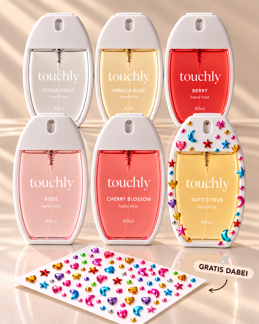 Sechs Touchly-Düfte mit Gratis-Stickerbogen und einer mit bunten Glitzersteinen verzierten Soft-Citrus-Flasche.
